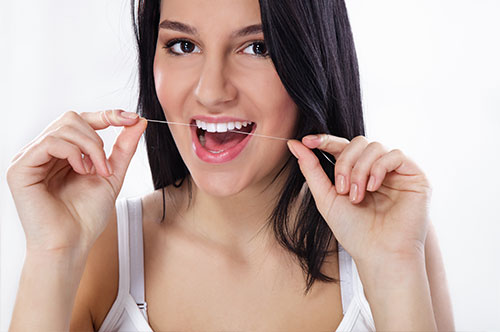 This National Flossing Day, Step Up Your Smile Game!